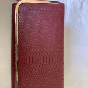 Burgundy clutch